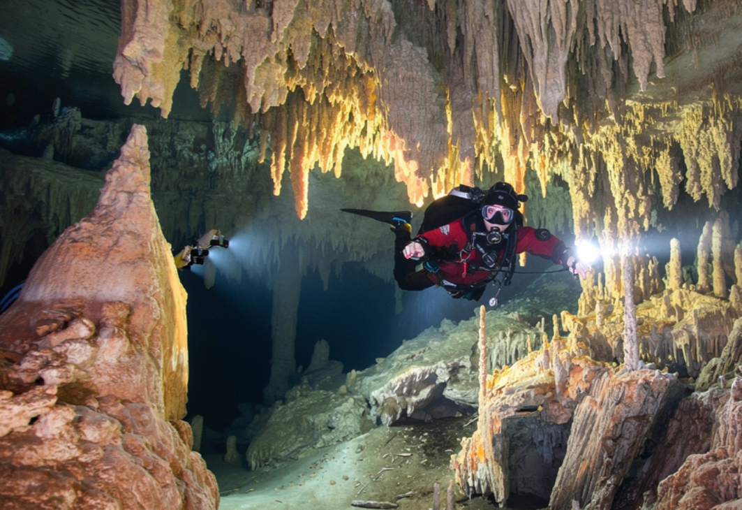 Technical cave diving team preparing gear