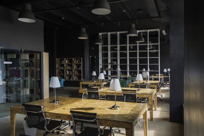 Collaborative workspace with team members discussing