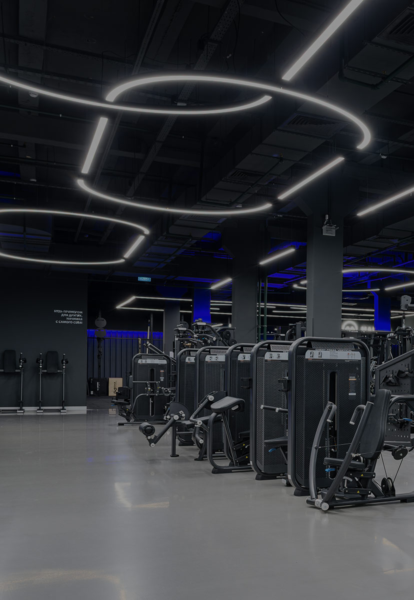 Client celebrating fitness milestone with trainer