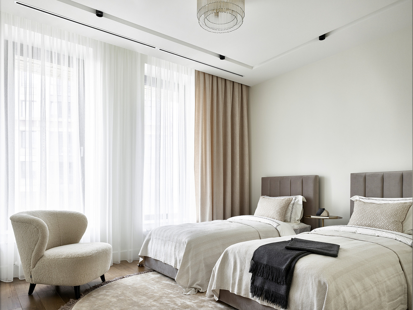 Refined dining and hospitality interior with layered lighting and natural textures